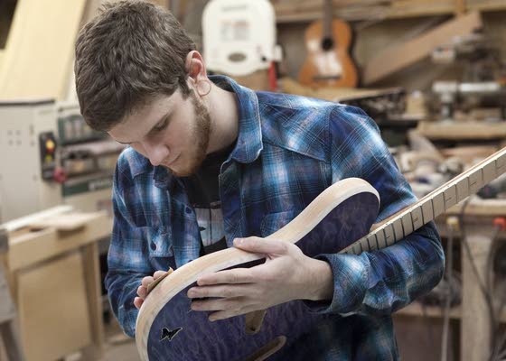 Stockton grad teaching himself to make guitars in Pleasantville to earn a living